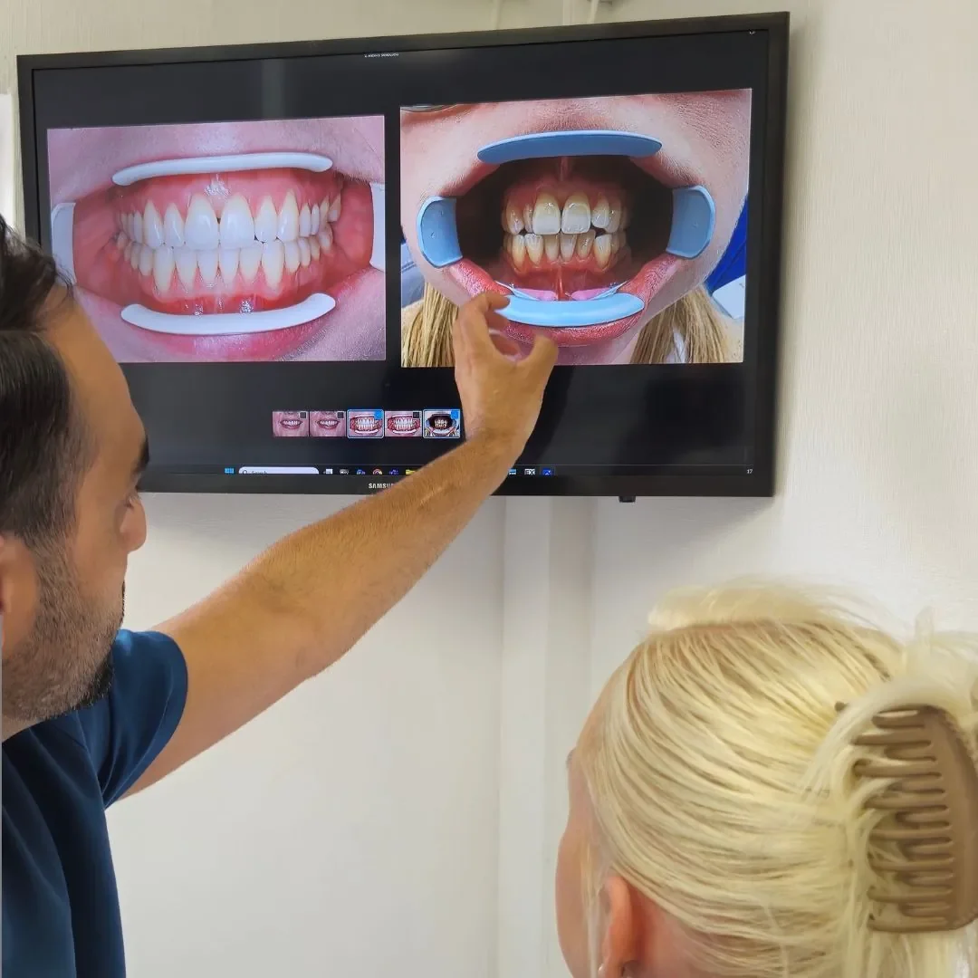 Patient consultation with dental professional at Pear Tree Dental